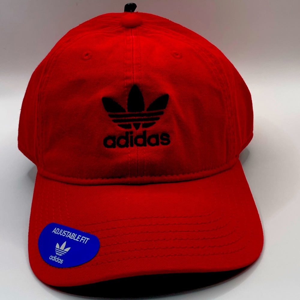 Red Adidas strap back hat.